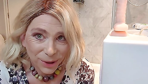 Blonde milf gets a dildo and her ass gets fucked hard