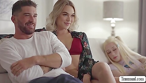 Blonde shemale rides a huge cock and takes it inside