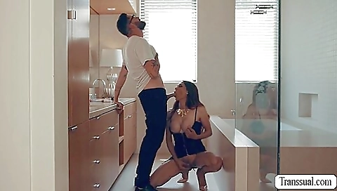 Big-titted stepmom is deepthroating in the kitchen