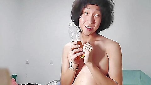 Asian girl with a juicy ass is making love to herself