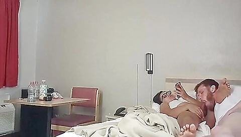 Horny redhead peeping on a dick and blowing her cock