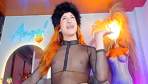 Tattooed redhead with natural tits enjoys a long blowjob